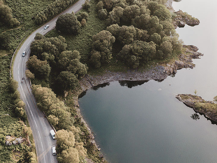  aerial-photography-of-roadway-and-body-of-water