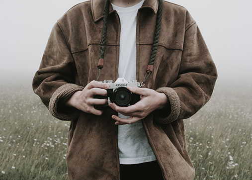  photo-of-person-holding-camera